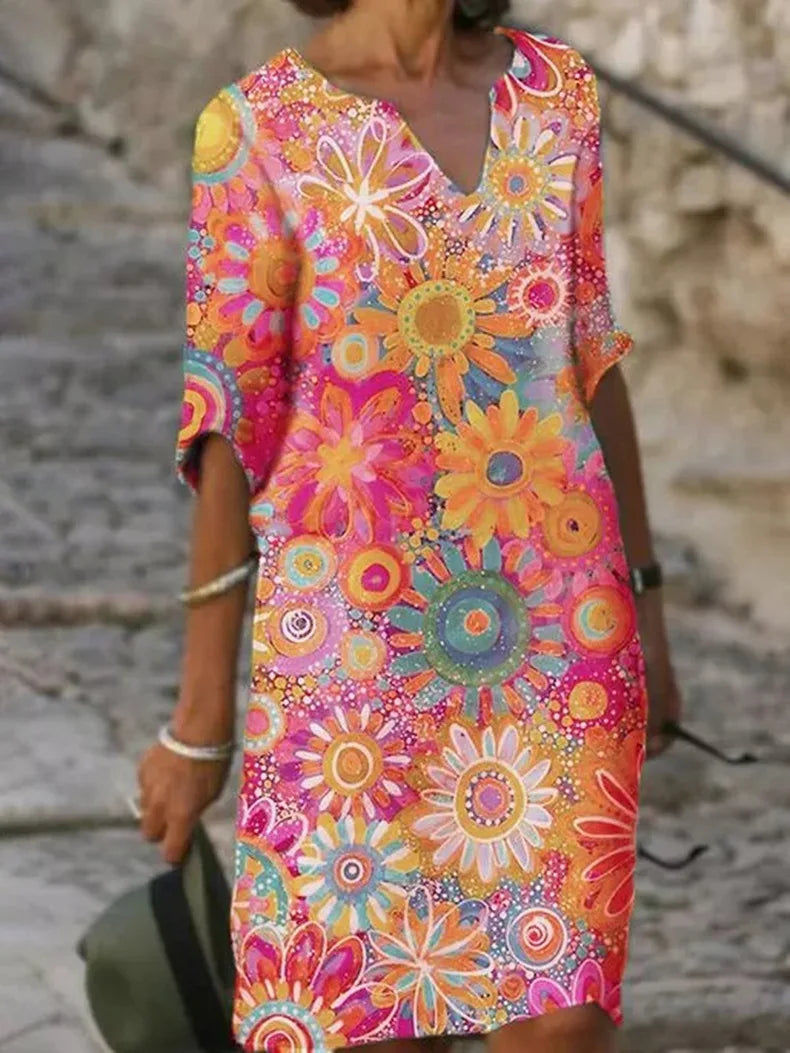 Leichtes Damenkleid mit Blumendruck – Verspielter Sommerlook mit V-Ausschnitt