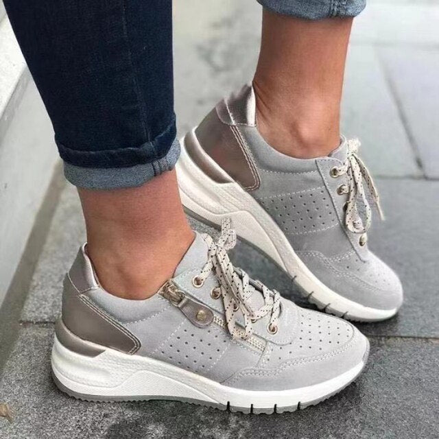 Damen-Sneaker mit seitlichem Reißverschluss und Keilsohle