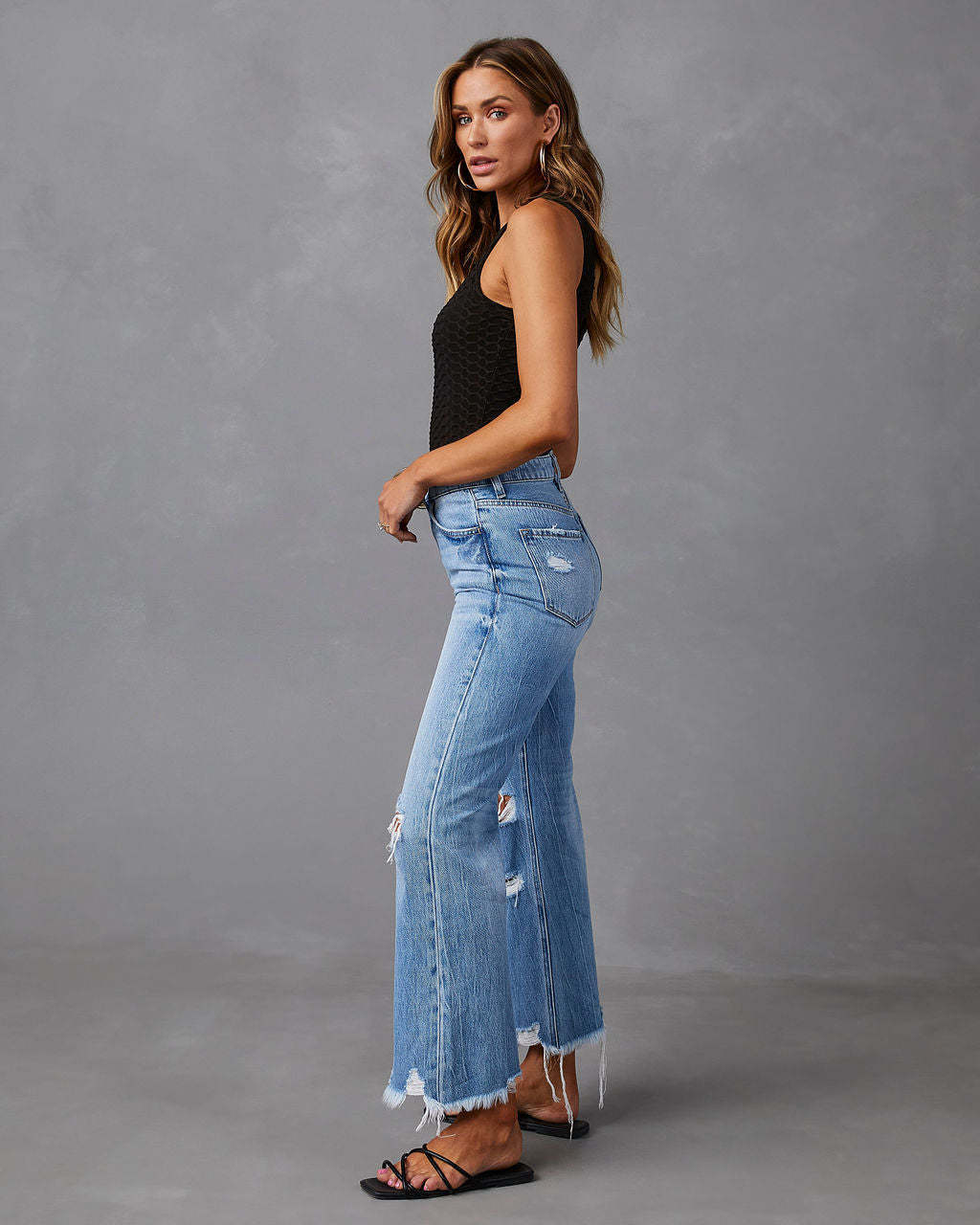 Hochtaillierte Jeans im europäischen Stil mit Rissen